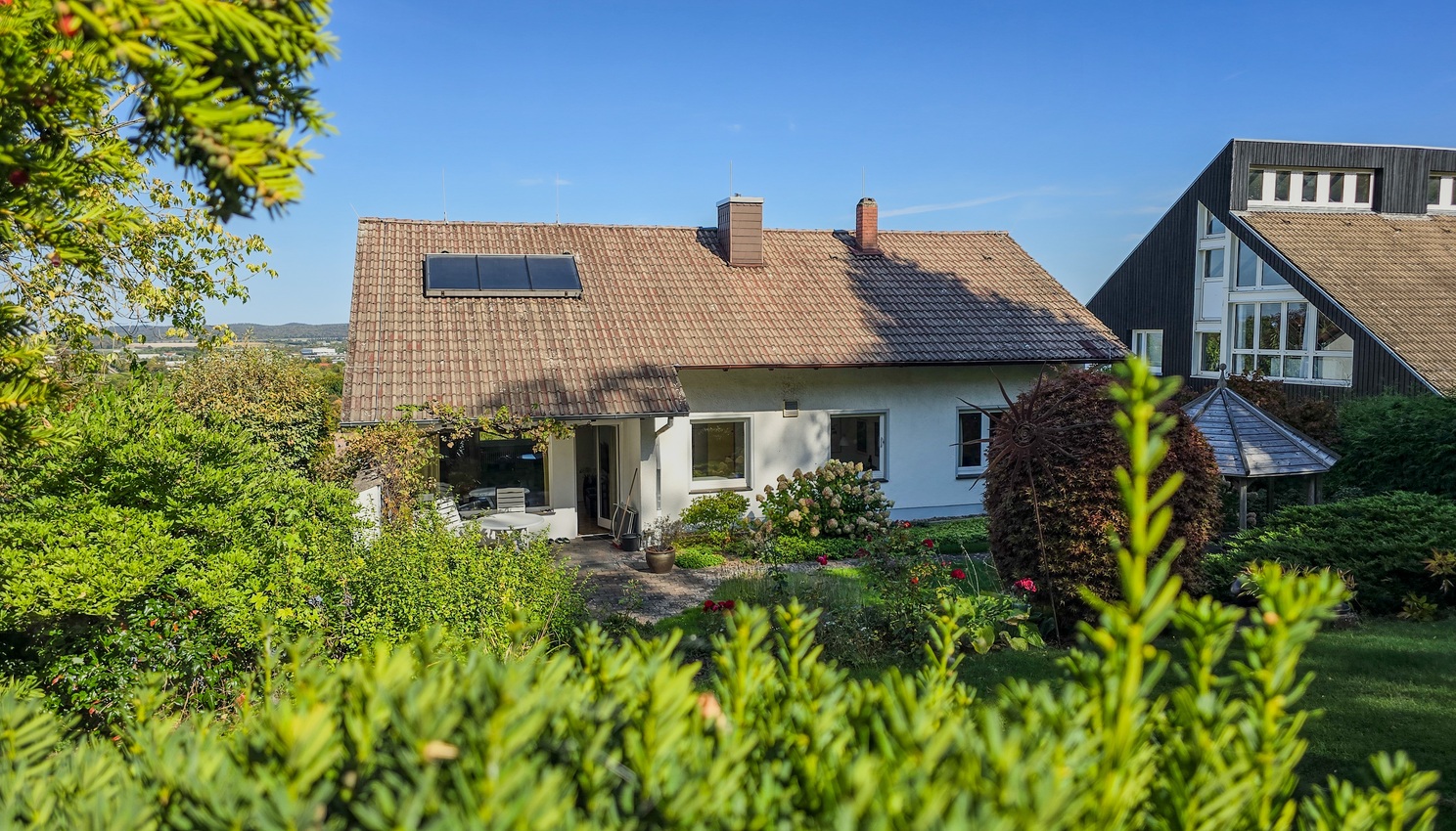 Gartenseite des Einfamilienhauses am Schieferweg